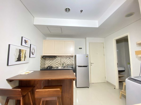 Sewa apartemen orange county cikarang