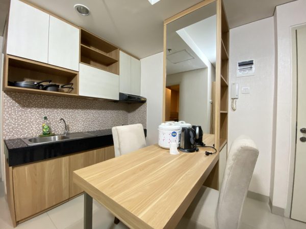 Sewa apartemen orange county cikarang