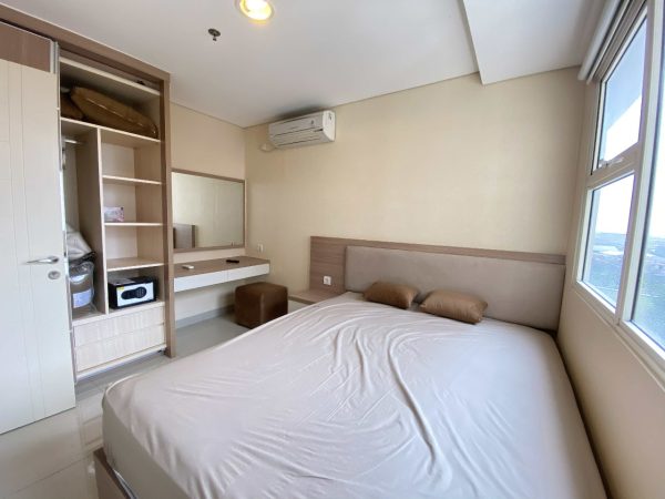 Sewa apartemen orange county cikarang