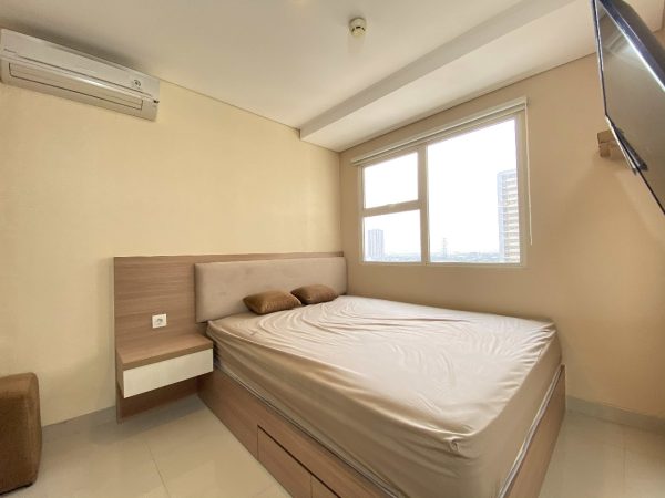 Sewa apartemen orange county cikarang